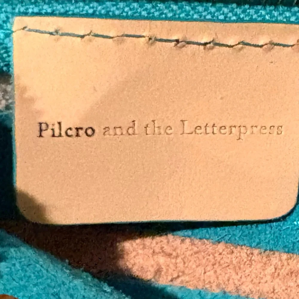 Anthropologie Pilcro and the Letterpress striped leather wristlet clutch